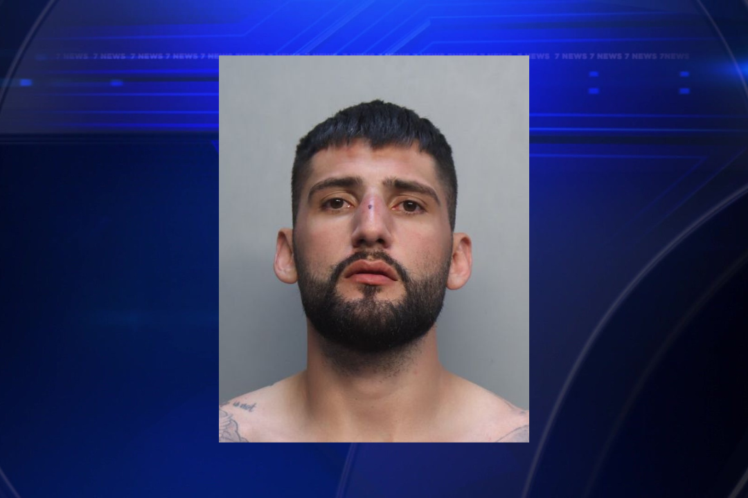 Miami police detain driver who fled scene after hitting construction worker