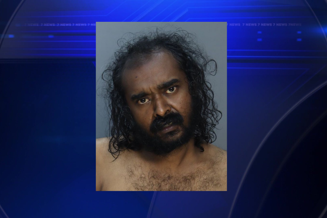 Man charged with assaulting elderly roommate and police officer