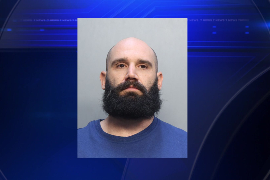 Man arrested in connection with fatal fall from 25th-floor Miami Beach condo