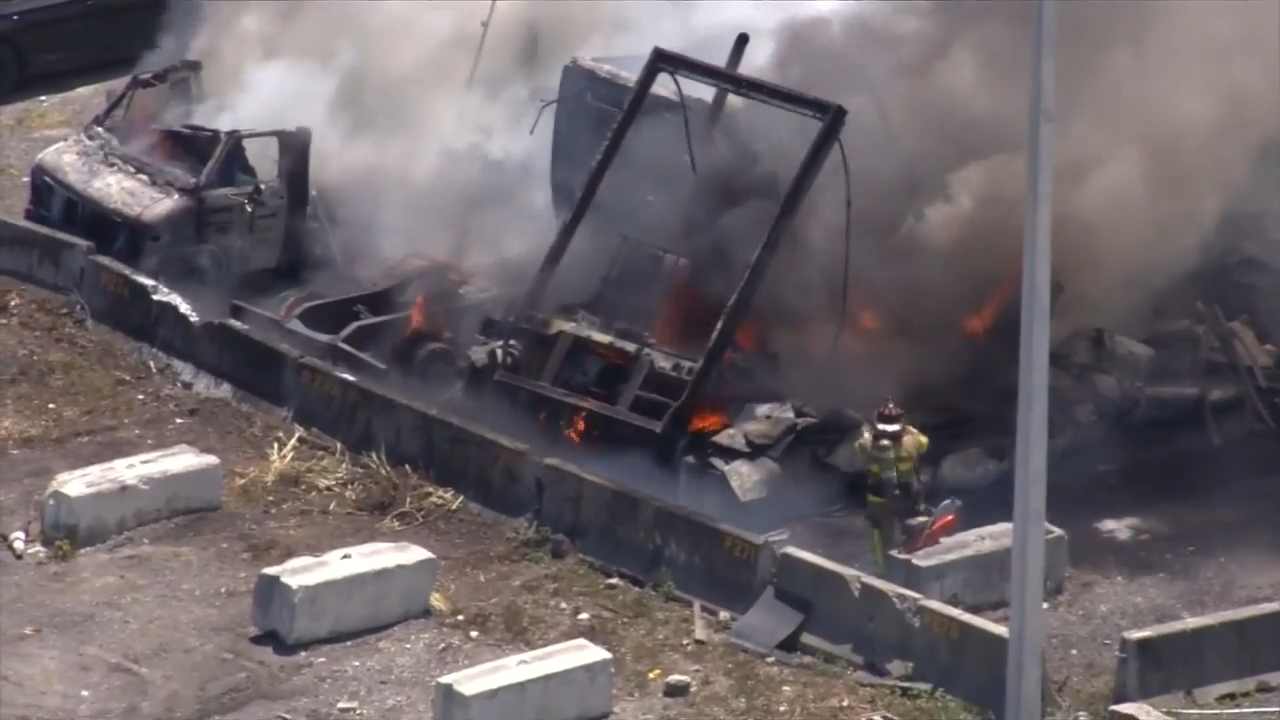Multiple vehicles left charred after fire erupts in NW Miami-Dade