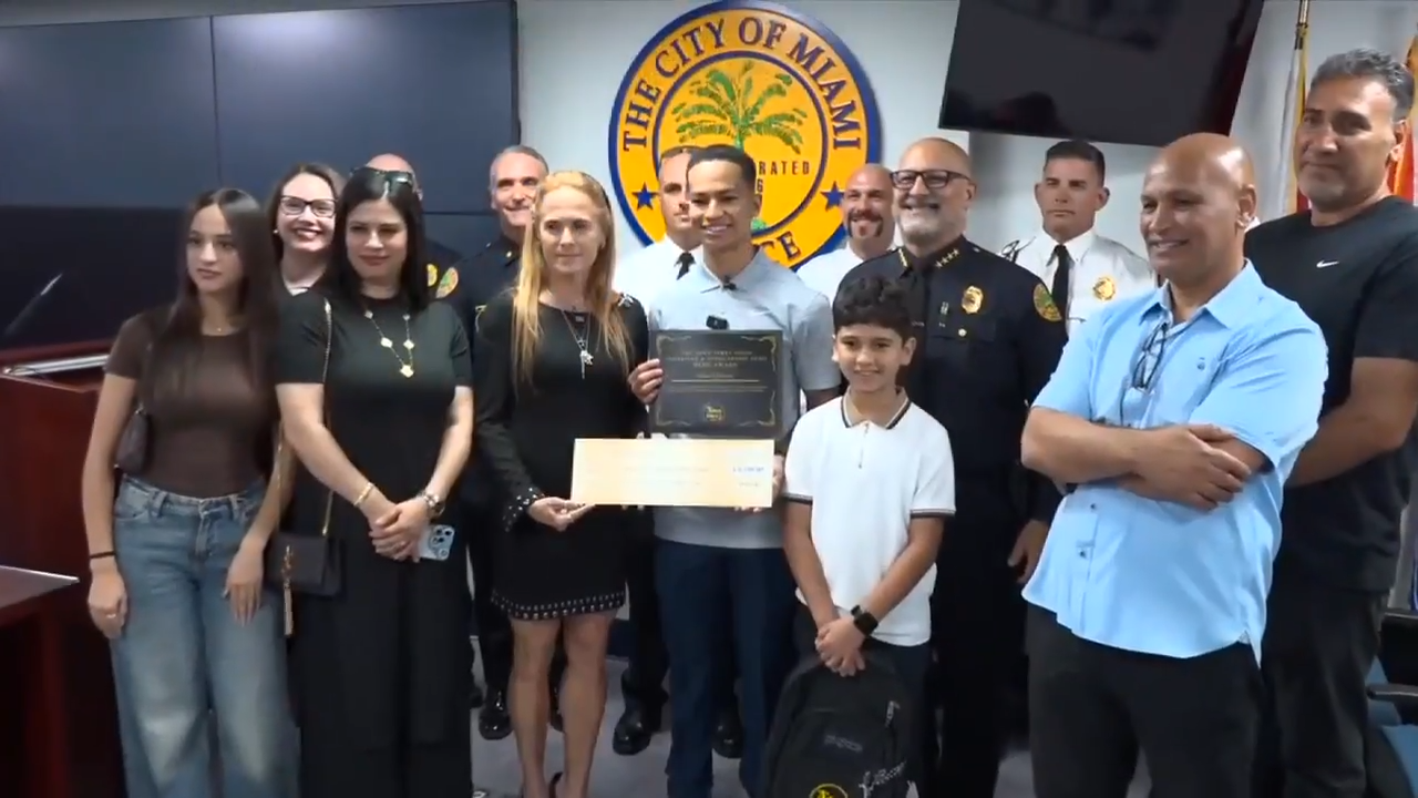 Teen who saved retired officer from burning building honored with tour of Miami Police Department, full scholarship to police academy