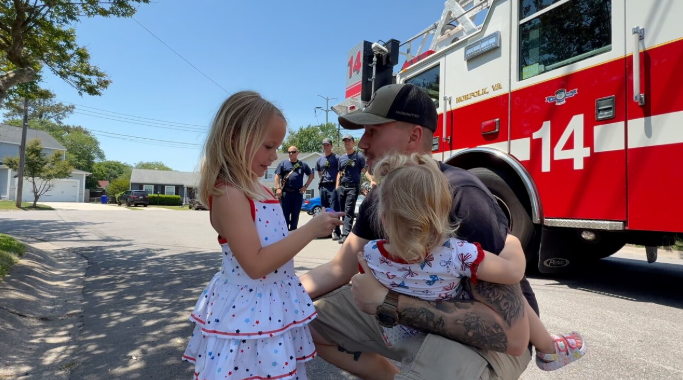 Norfolk sailor surprises daughters with fire truck homecoming