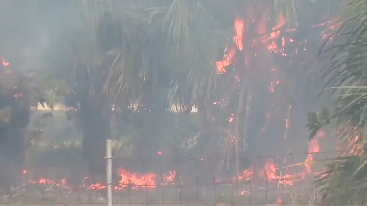 Fire crews enter 2nd day battling 2-alarm grass fire in West Kendall; 25 acres burned