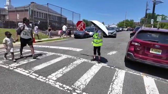 Eastern US sweats through another hot day before rain, cold move in