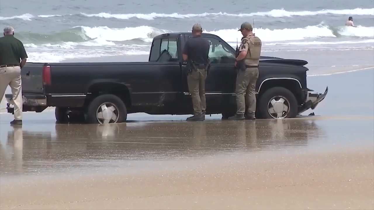 Florida toll attendant killed after truck driver crashes into booth, speeds through beach; driver arrested