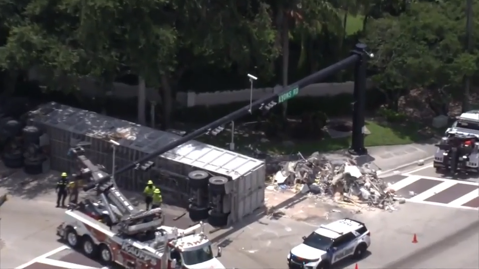 Tractor-trailer overturns, spills debris in Coconut Creek; no injuries reported