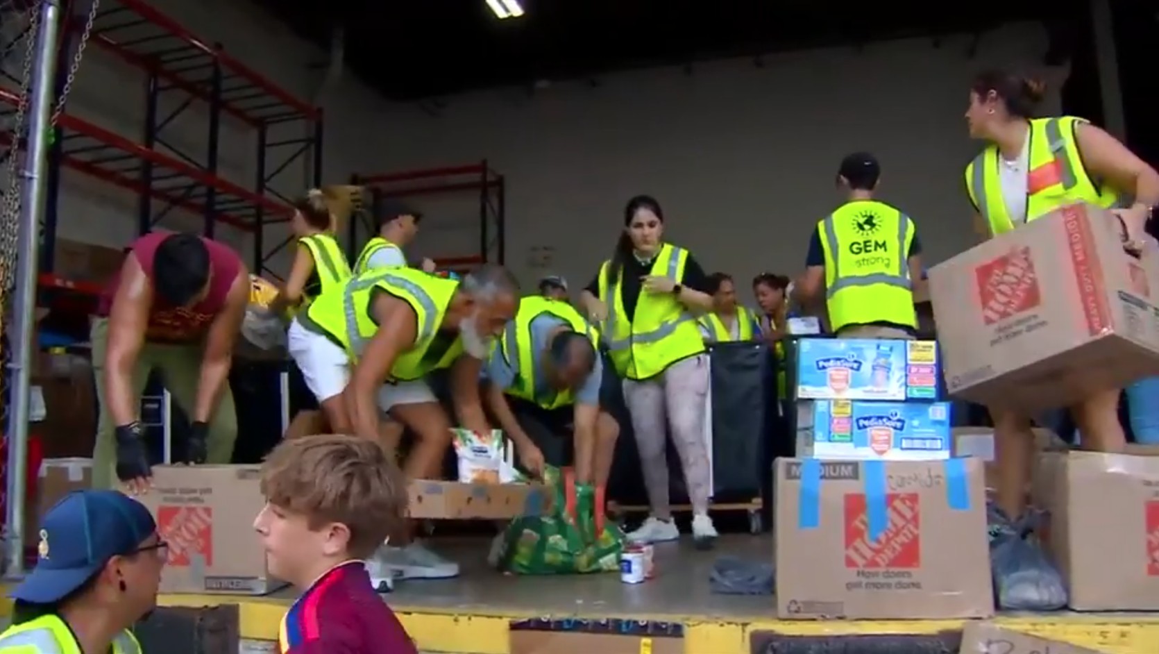 Volunteers of all ages continue coming to GEM’s headquarters, Food for the Poor to help quake-impacted Venezuelans
