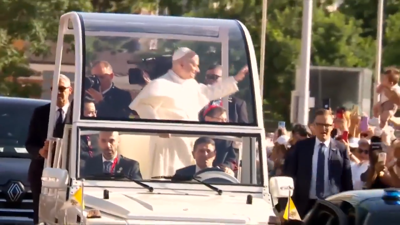 1 million people flood Madrid streets to see the pope’s flower-carpeted procession
