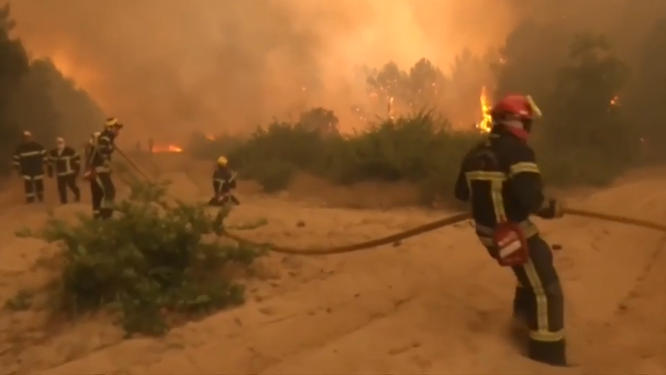 France and Spain battle wildfires as more than 250,000 people are forced to flee homes