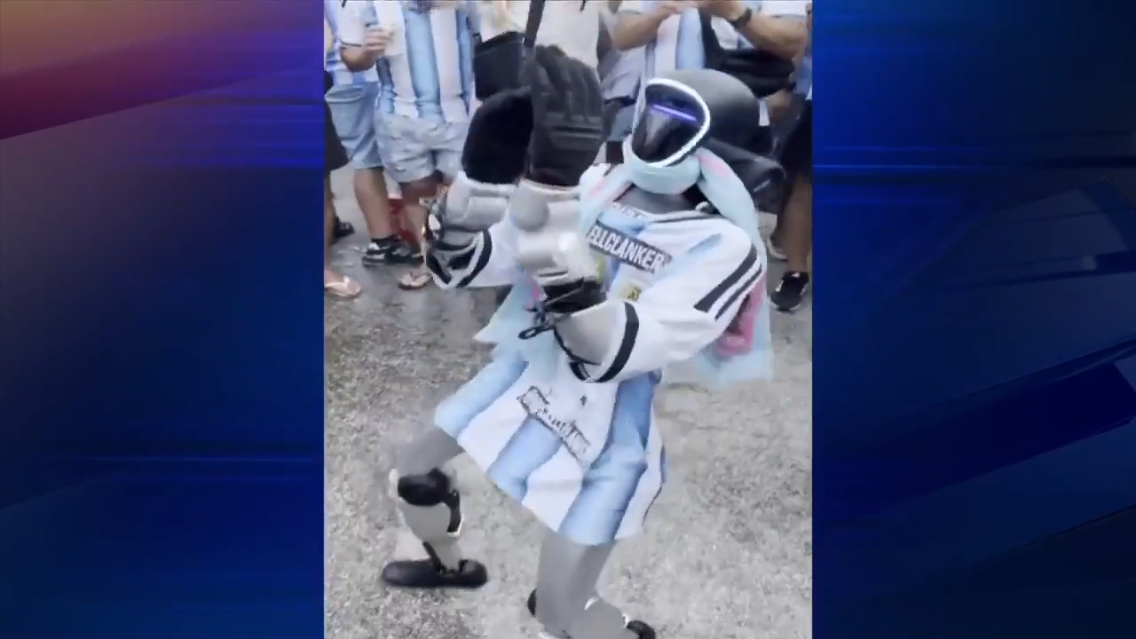 Humanoid robot joins Argentina soccer fans at rally in Miami Beach