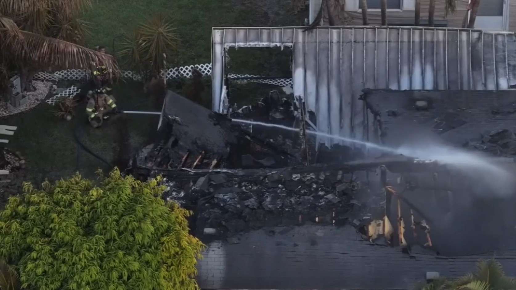 Crews put out mobile home fire in Davie, prevent it from spreading; no injuries