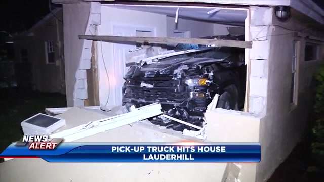Pickup truck slams into Lauderhill home, destroying front of property