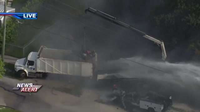 1 hospitalized after 3 public works trucks catch fire in SW Miami-Dade
