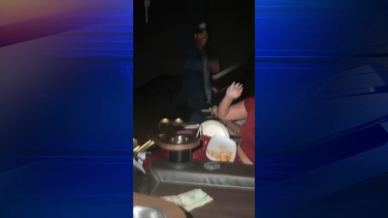 Woman says laughing at movie scene led to man hitting her with pizza pan inside luxury theater in Coconut Grove