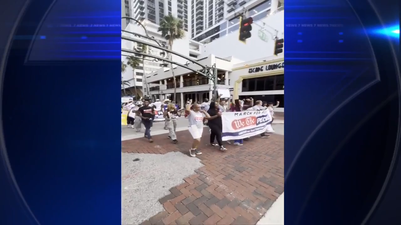 wsvn.com - Jayme Berezdivin - Demonstrators take to the streets in downtown Fort Lauderdale to demand protections for democracy, healthcare access - WSVN 7News | Miami News, Weather, Sports | Fort Lauderdale