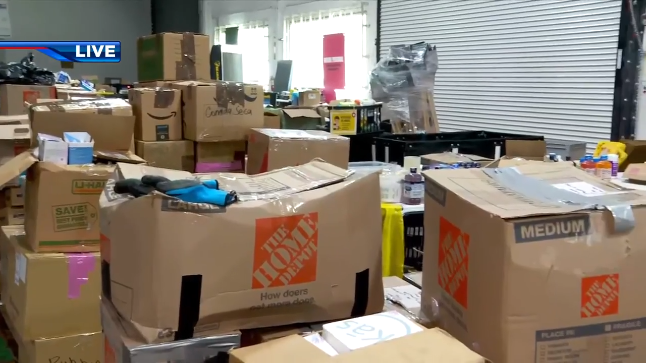 GEM warehouse in Doral discussing plans to provide aid to Colombia after earthquake