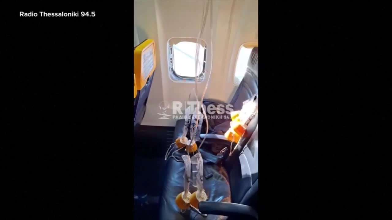 A jet engine fan blade cut into a plane and caused a passenger to be partially sucked out of a window, the NTSB says