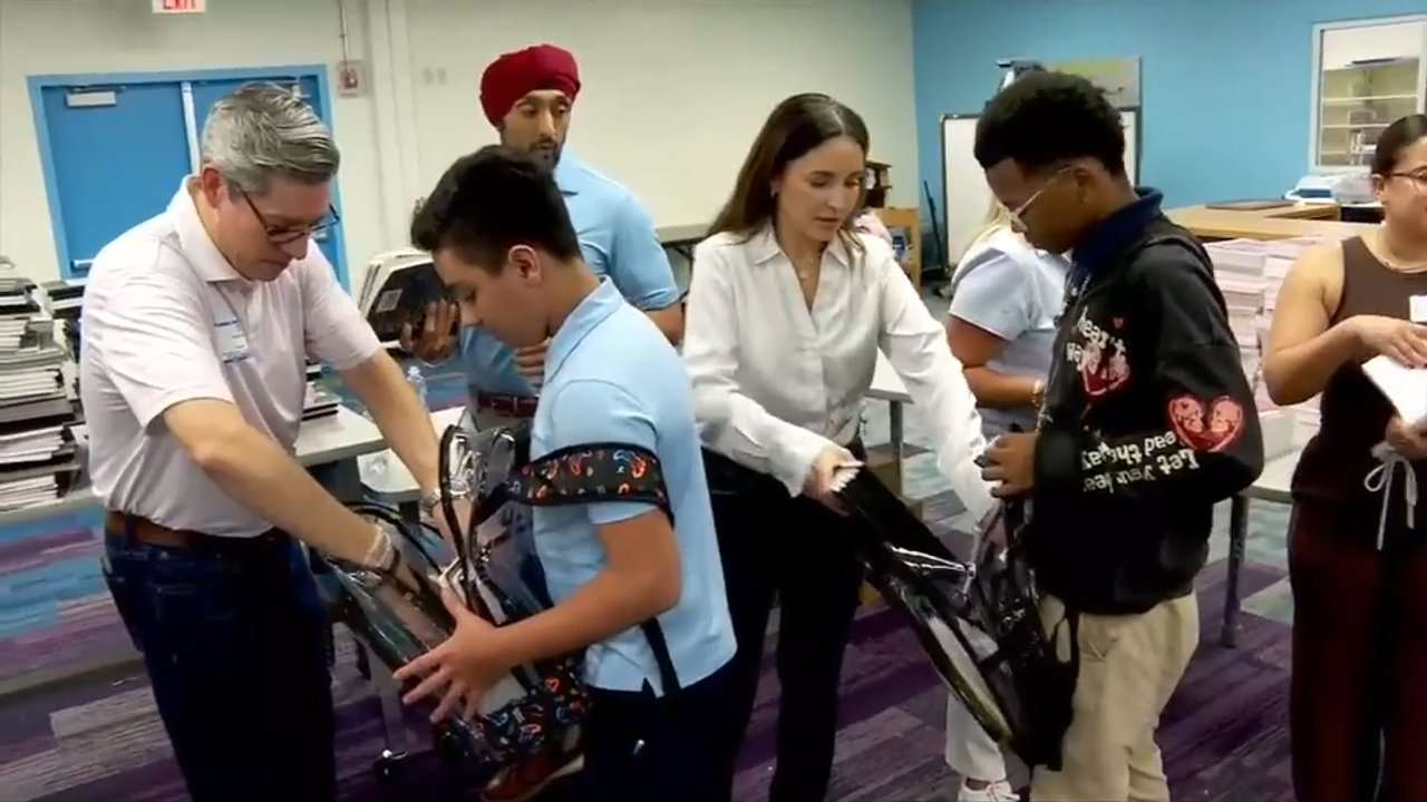 Miami Marlins and Kiwanis Club Distribute School Supplies at Local K-8 Center