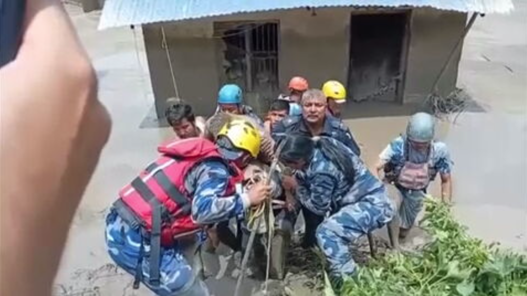 At least 98 killed and hundreds missing after flash floods in Nepal and China