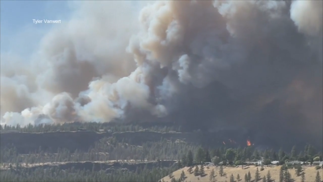Wind-driven wildfire prompts evacuations in eastern Washington