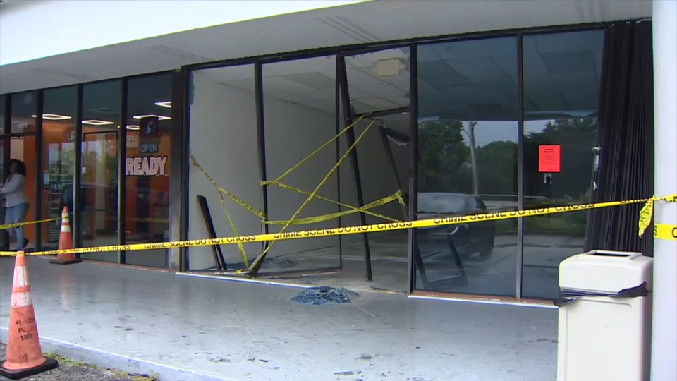 Driver hospitalized after crashing into building in Sunrise