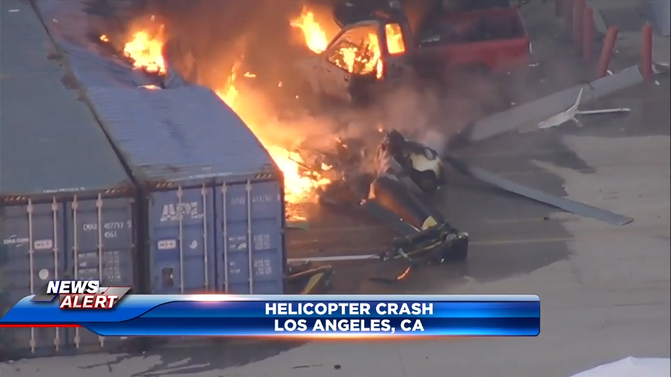 Helicopter crashes, killing at least 1 person, near a bus crash in Los Angeles