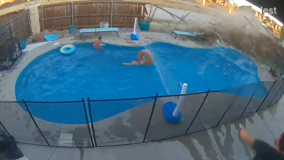 Video shows car crashing through backyard fence, narrowly missing ...