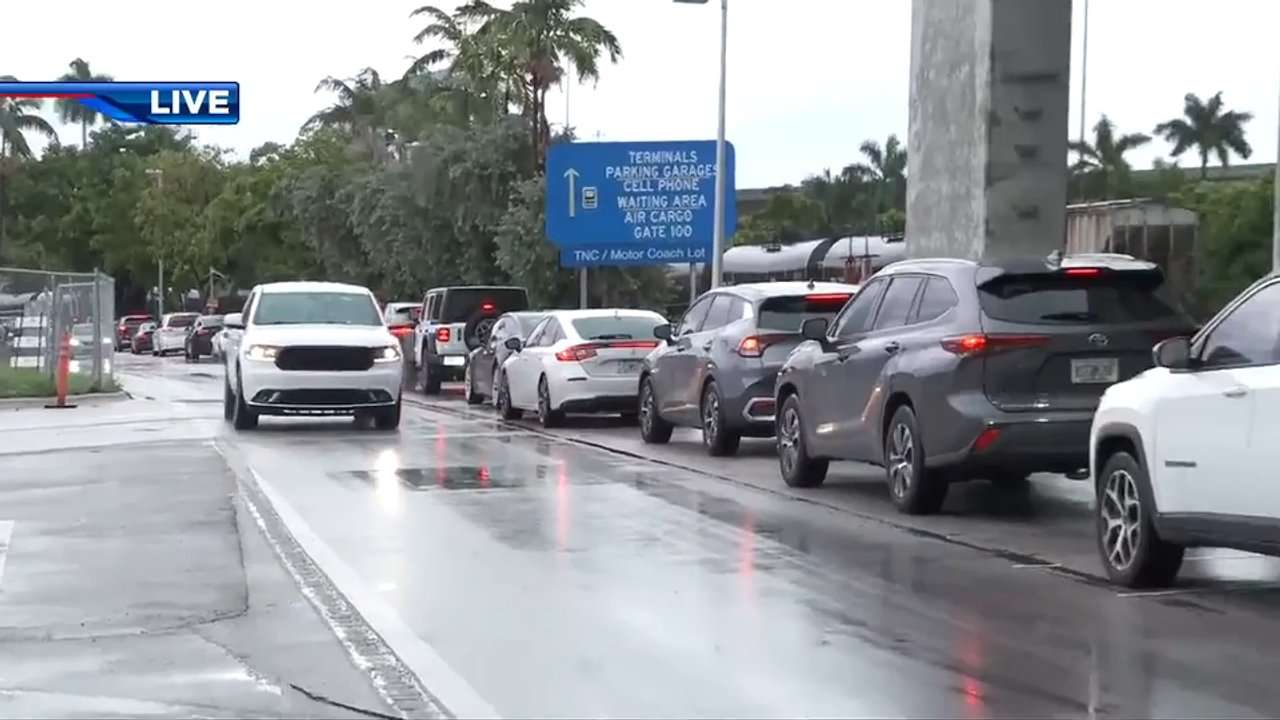 Storm-induced flooding traps travelers in bumper-to-bumper traffic at FLL
