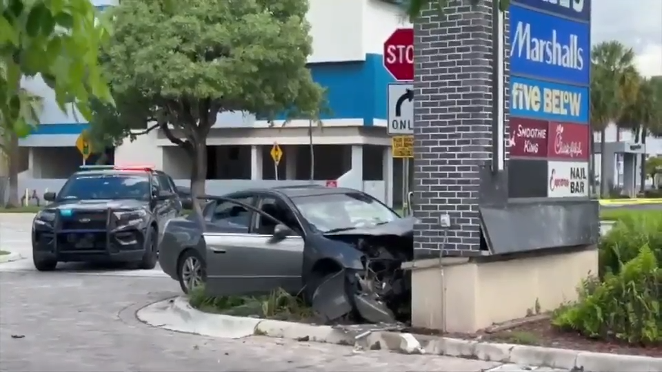 One in critical condition after crashing into a North Miami Beach strip mall sign
