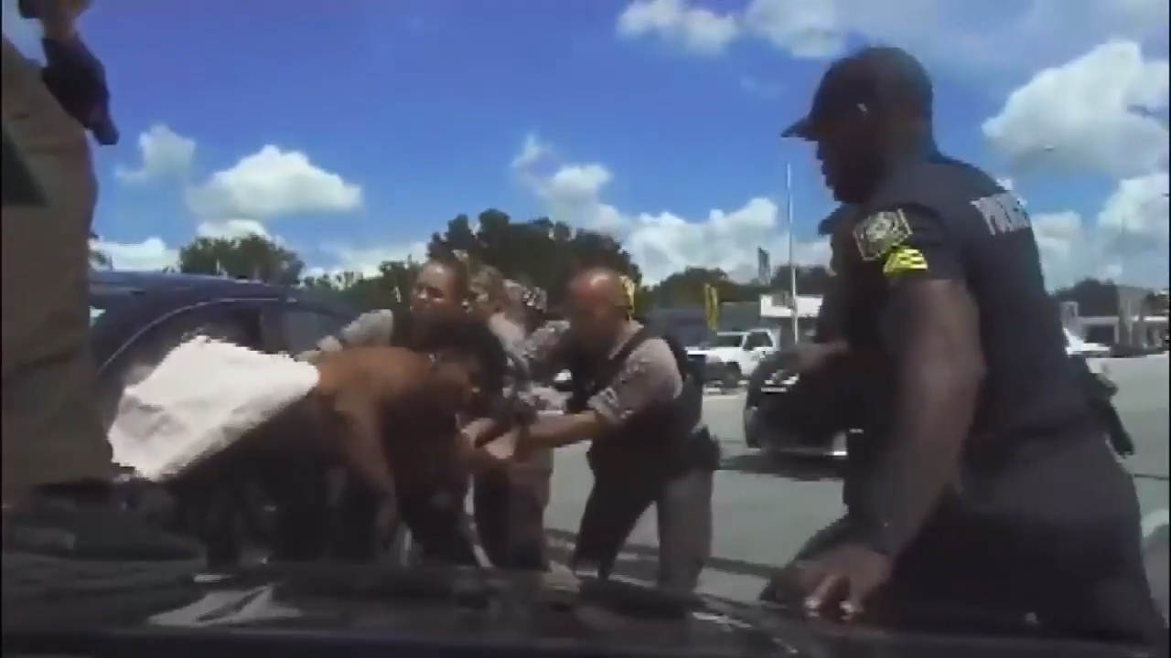 Dash camera footage captures the arrest of an alleged carjacker who led police on wild pursuit across NW Miami-Dade, Hialeah