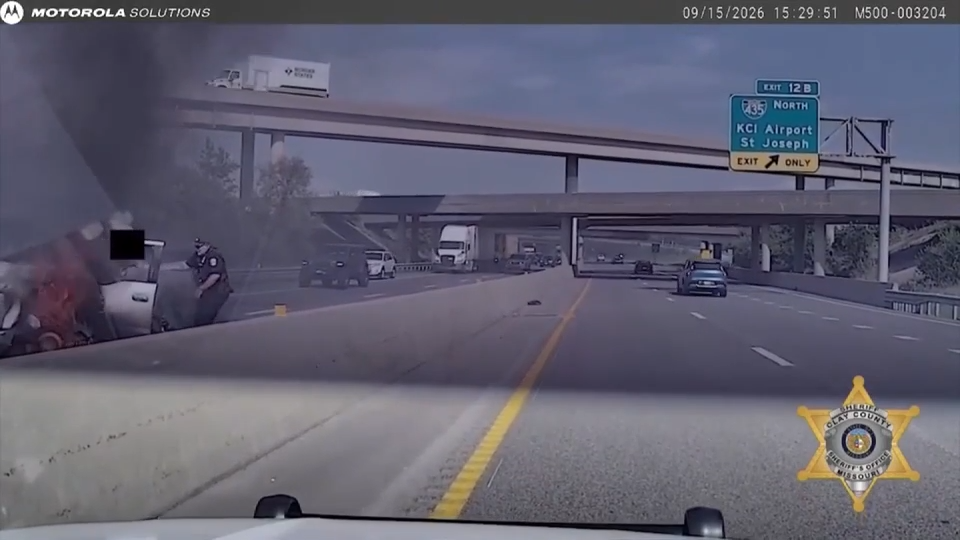 Video captures Kansas City officer, Clay County deputy rescue man from burning truck