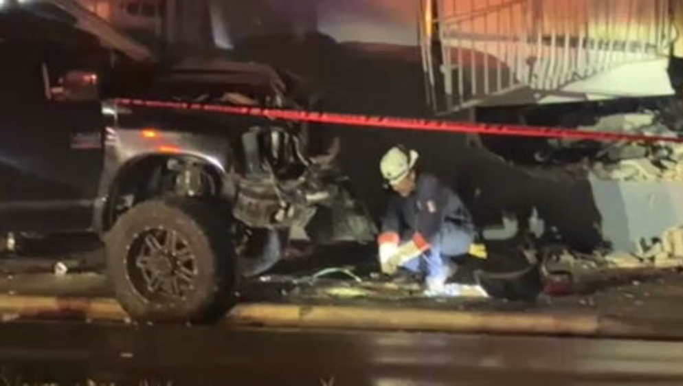 Driver knocks down pole, crashes into home in Miami
