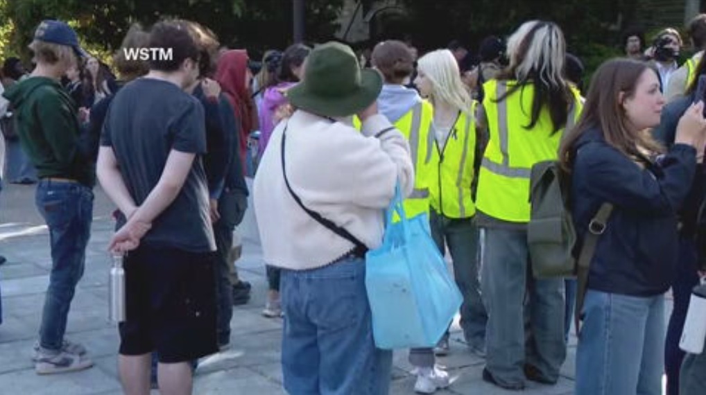 A crowd of students protests Cornell’s response to gang rape complaint